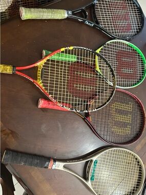Wilson Tennis Racket Lot with Red, Green, Yellow, Black Accents